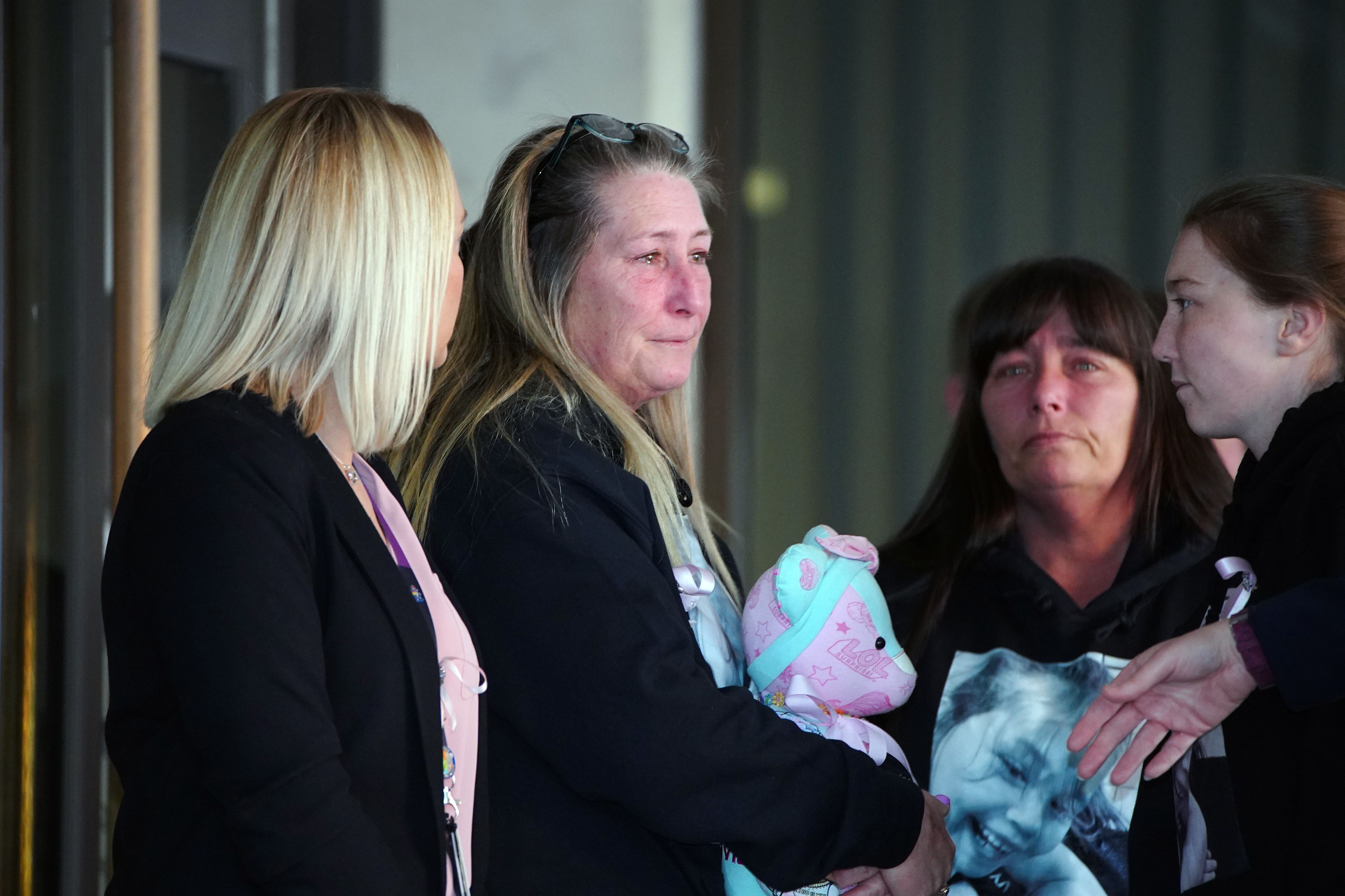 Cheryl Korbel, (second left) mother of nine-year-old Olivia Pratt-Korbel outside Manchester Crown Court after Thomas Cashman, 34, of Grenadier Drive, Liverpool, was sentenced to a minimum term of 42 years, for the murder of nine-year-old Olivia Pratt-Korbel, who was shot in her home in Dovecot on August 22 last year, the attempted murder of Joseph Nee, the wounding with intent of Olivia’s mother Cheryl Korbel and two counts of possession of a firearm with intent to endanger life. Picture date: Monday April 3, 2023.