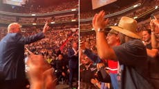 Crowd chants ‘U-S-A’ as Donald Trump turns and waves at UFC 287 in Miami