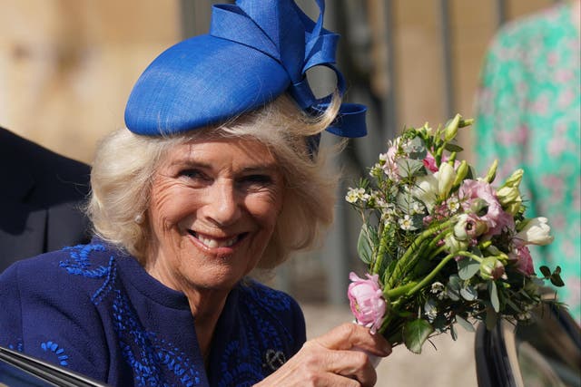 <p>Queen Camilla waves to wellwishers after attending the Easter Mattins Service at Windsor Castle</p>