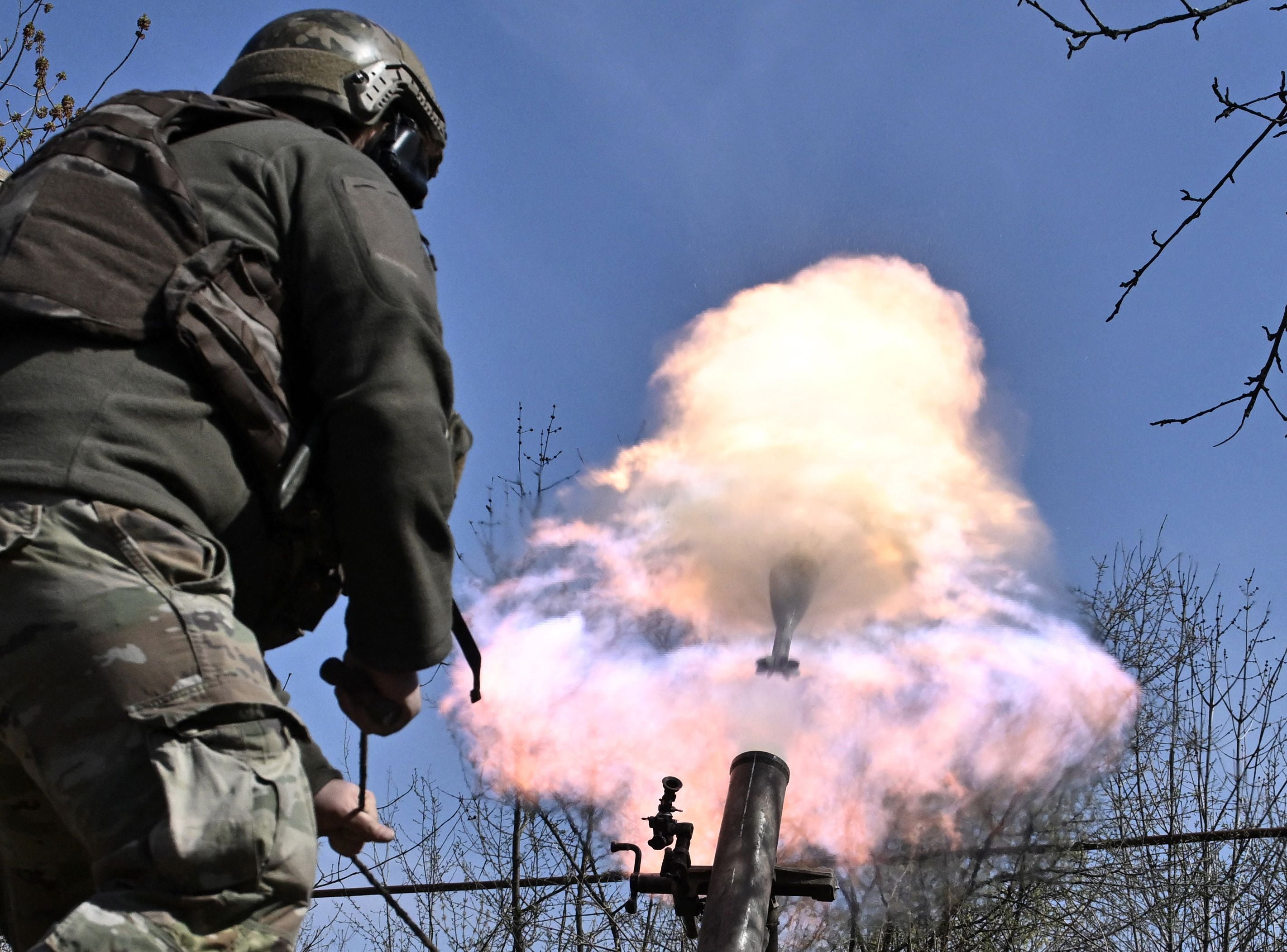 <p>Belarusian volunteer soldiers from the Kastus Kalinouski regiment fire a mortar near Bakhmut </p>