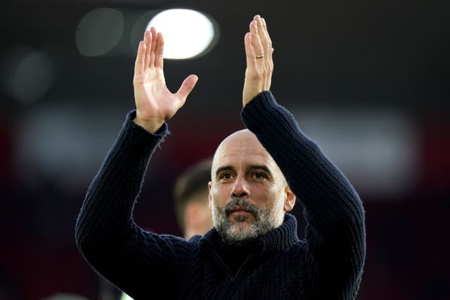 Pep Guardiola applauds the fans after victory over Southampton (Adam Davy/PA)