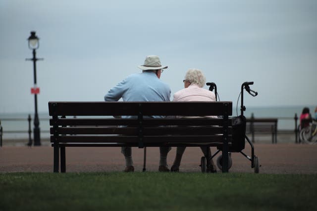 <p>Senior citizens relax on Llandudno Promenade on September 8, 2014 in Llandudno, Wales</p>