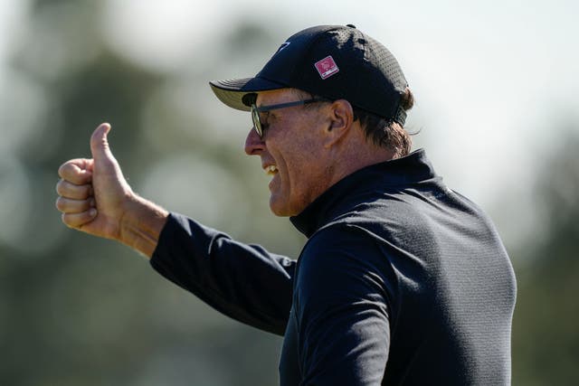 Phil Mickelson reacts on the 18th hole after a final round of 65 in the Masters (David J. Phillip/AP)