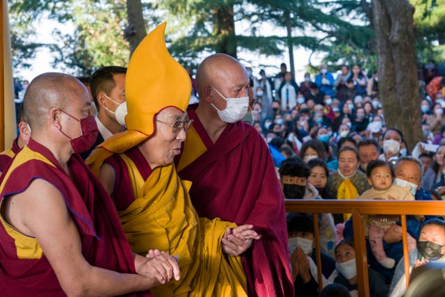 <p>The Dalai Lama (centre) seen in Dharamshala, India in March 2023 </p>