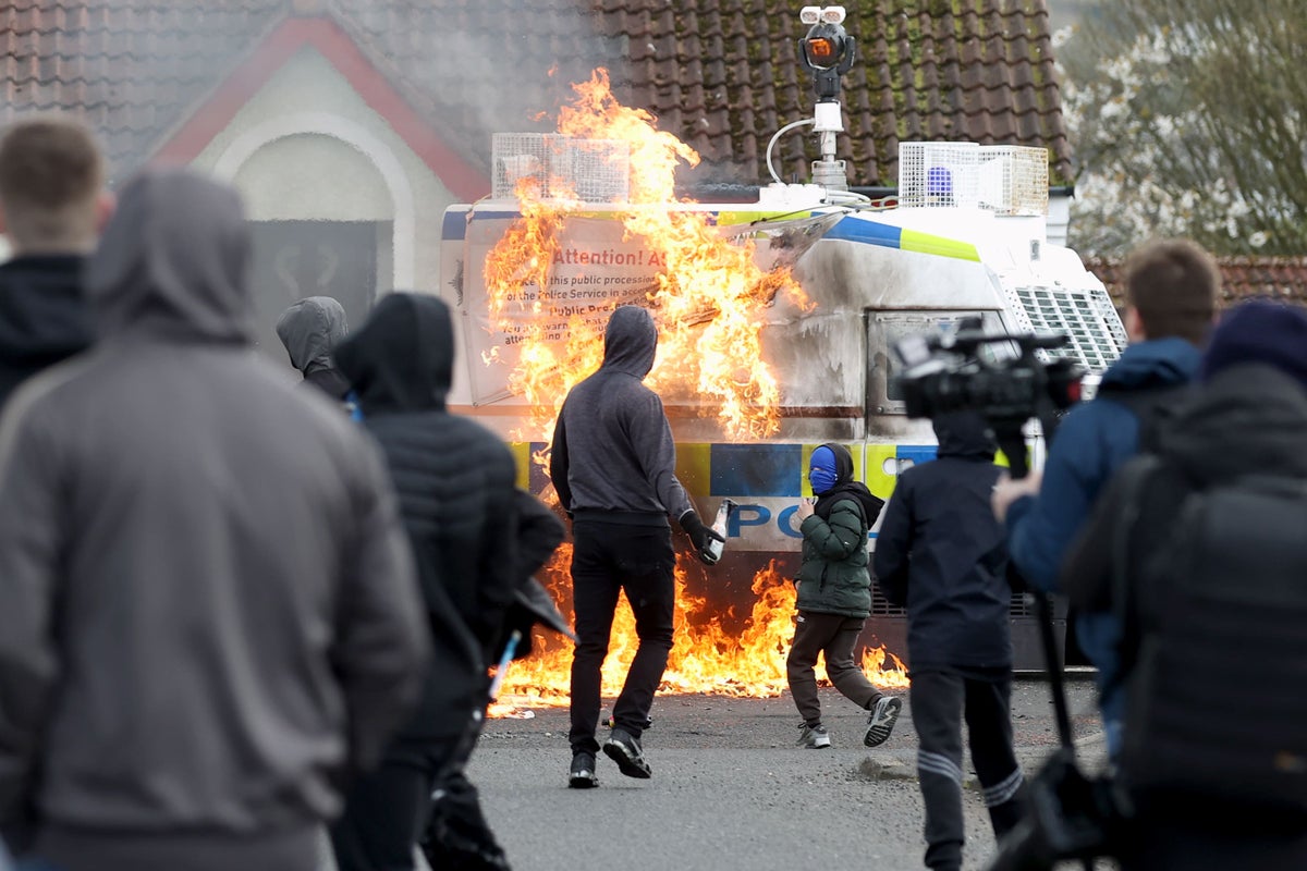 Appeal for calm as police attacked with petrol bombs at dissident march