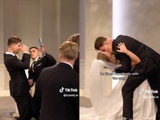 Groomsmen help prepare groom for first kiss with bride in viral wedding skit: ‘Too cute’