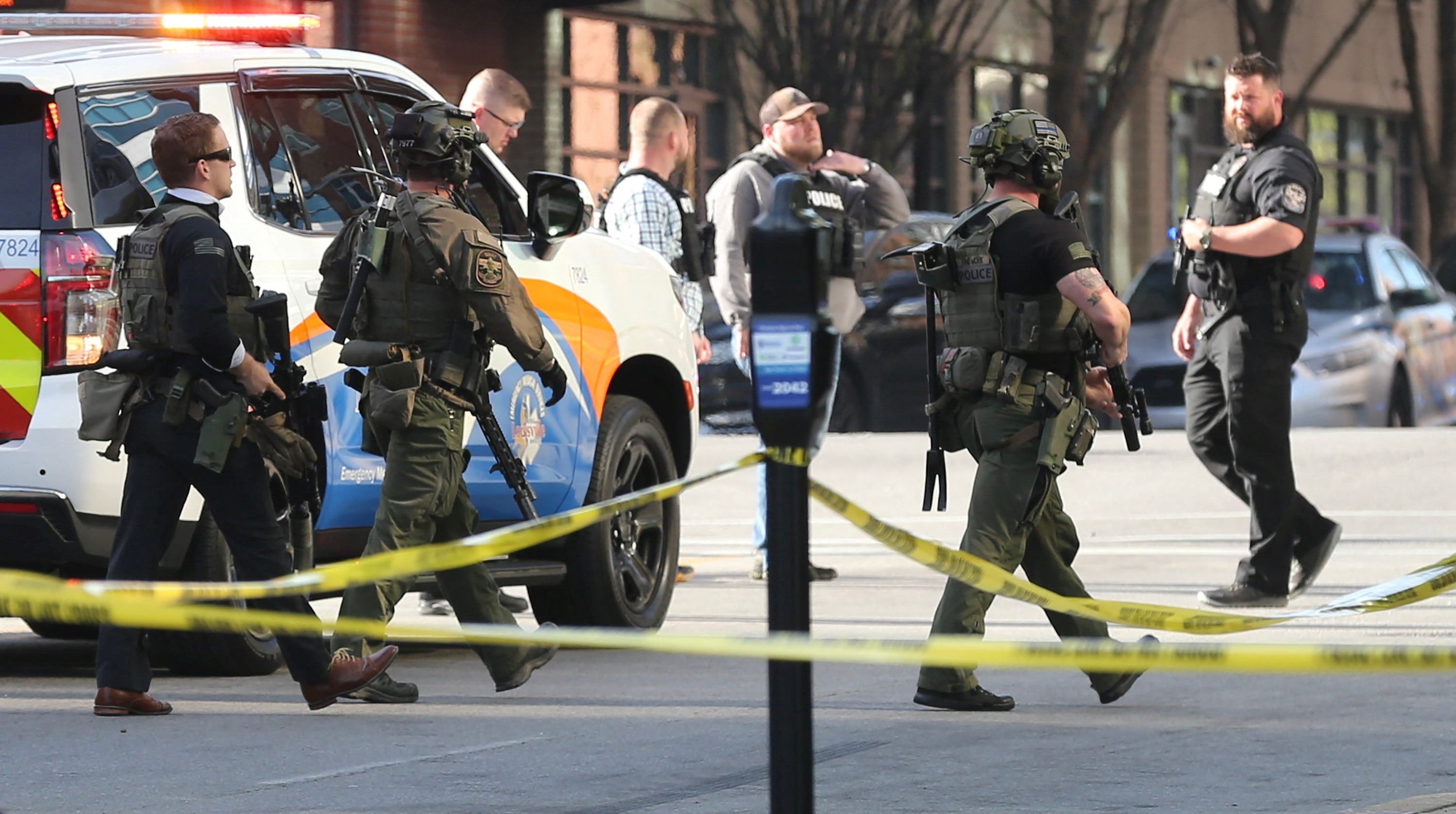 <p>Police deploy at the scene of a mass shooting near Slugger Field baseball stadium in downtown Louisville, Kentucky</p>