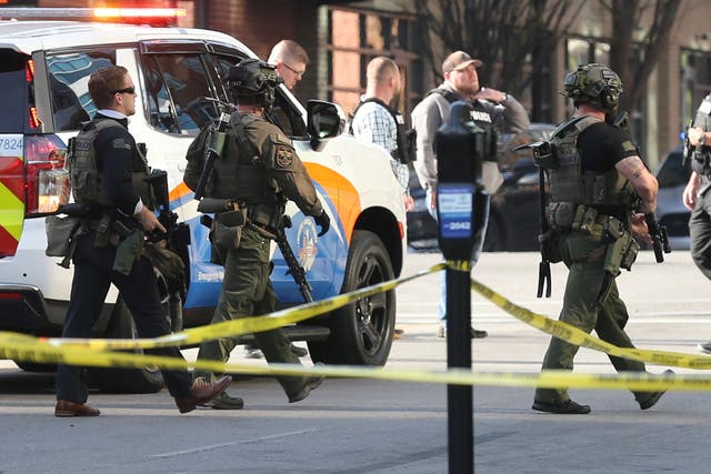 <p>Police deploy at the scene of a mass shooting near Slugger Field baseball stadium in downtown Louisville, Kentucky</p>