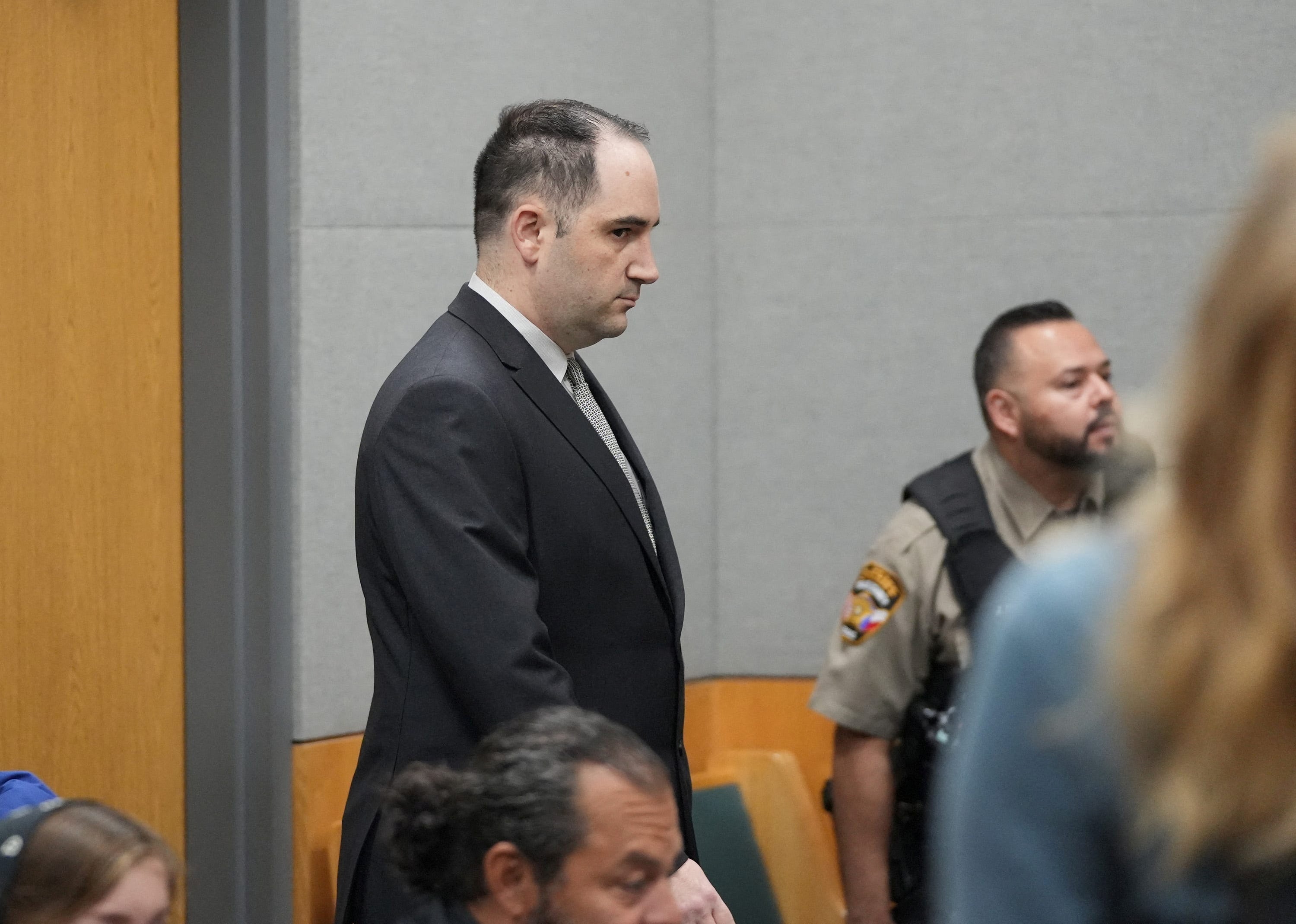 Daniel Perry walks into the courtroom moments before he was convicted of murder in the July 2020 shooting death of Garrett Foster at a Black Lives Matter protest