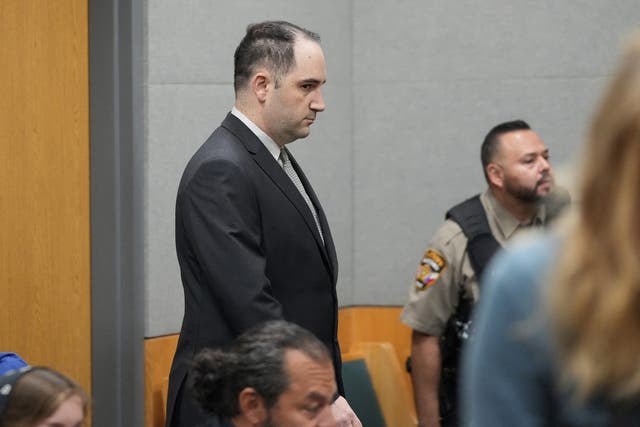 <p>Daniel Perry walks into the courtroom moments before he was convicted of murder in the July 2020 shooting death of Garrett Foster at a Black Lives Matter protest</p>