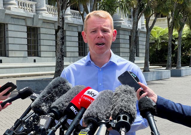 <p>File: New Zealand prime minister Chris Hipkins speaks to media outside parliament</p>