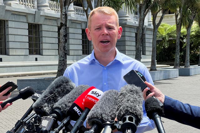 <p>File: New Zealand prime minister Chris Hipkins speaks to media outside parliament</p>