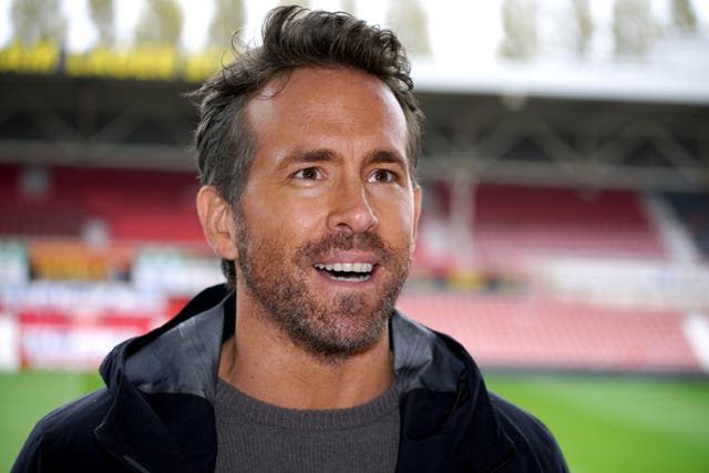 <p>Wrexham co-owner Ryan Reynolds says promoting only one team from the National League is ‘insane’ (Peter Byrne/PA)</p>