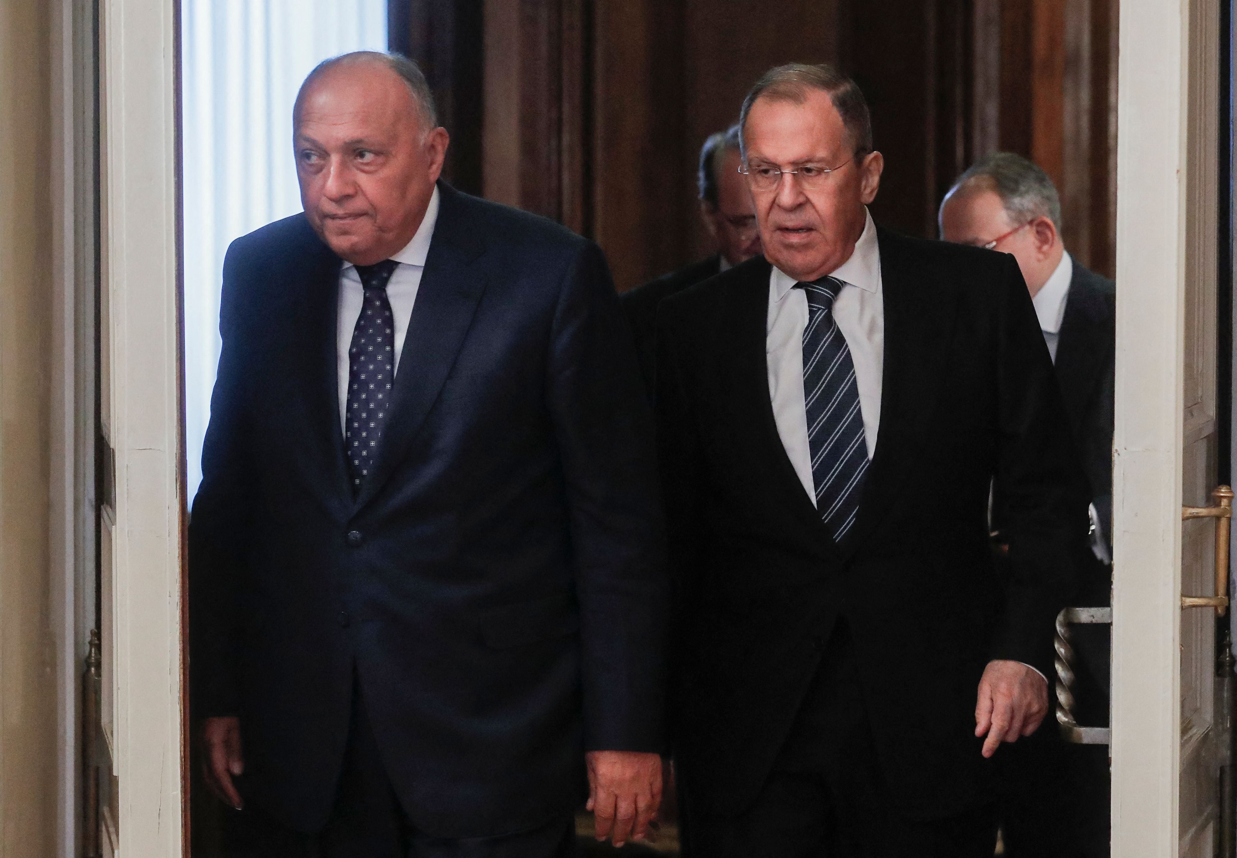 Russian foreign minister Sergei Lavrov (right) and his Egyptian counterpart Sameh Shoukry enter a hall during their meeting in Moscow