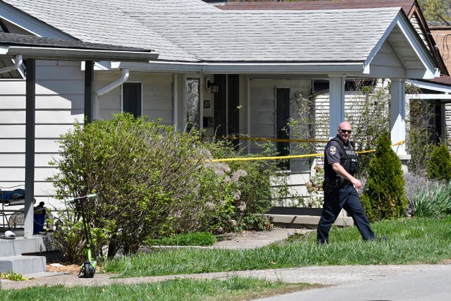 <p>Louisville police execute a search at the suspect’s home </p>