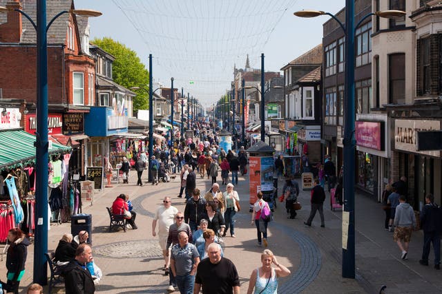 Shoppers on Great Yarmouth’s Regent Road (Alamy/PA)