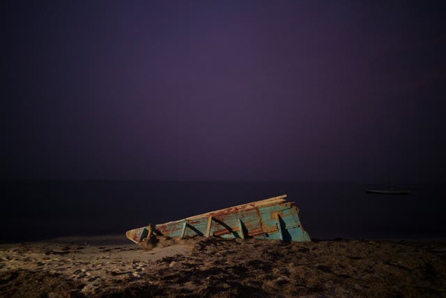 <p>File. The wreck of a traditional Mauritanian fishing boat, known as a pirogue, also used by migrants to reach Spain’s Canary Islands, sits on a beach near Nouadhibou, Mauritania, Thursday, 2 December 2021</p>