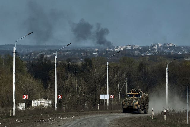 A Ukrainian APC seen on the road on the frontline in Bakhmut, Donetsk (Libkos/AP)