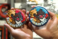 Why badges of Winnie the Pooh getting punched are taking Taiwan by storm
