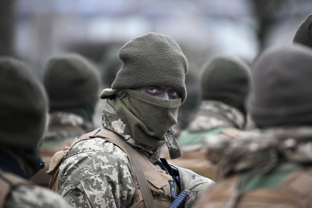 <p>A Ukrainian soldier is seen before the service near Salisbury, England</p>