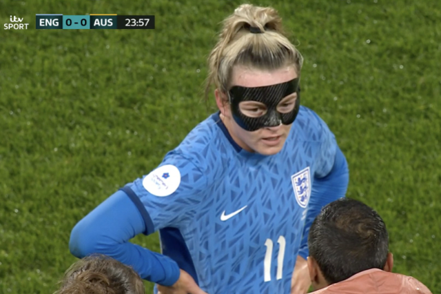 <p>Lauren Hemp wore a face mask during England’s defeat to Australia on Tuesday night</p>