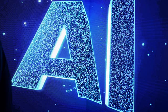 <p>An AI sign on an animated screen at Mobile World Congress (MWC) in Barcelona on 28 February, 2023</p>