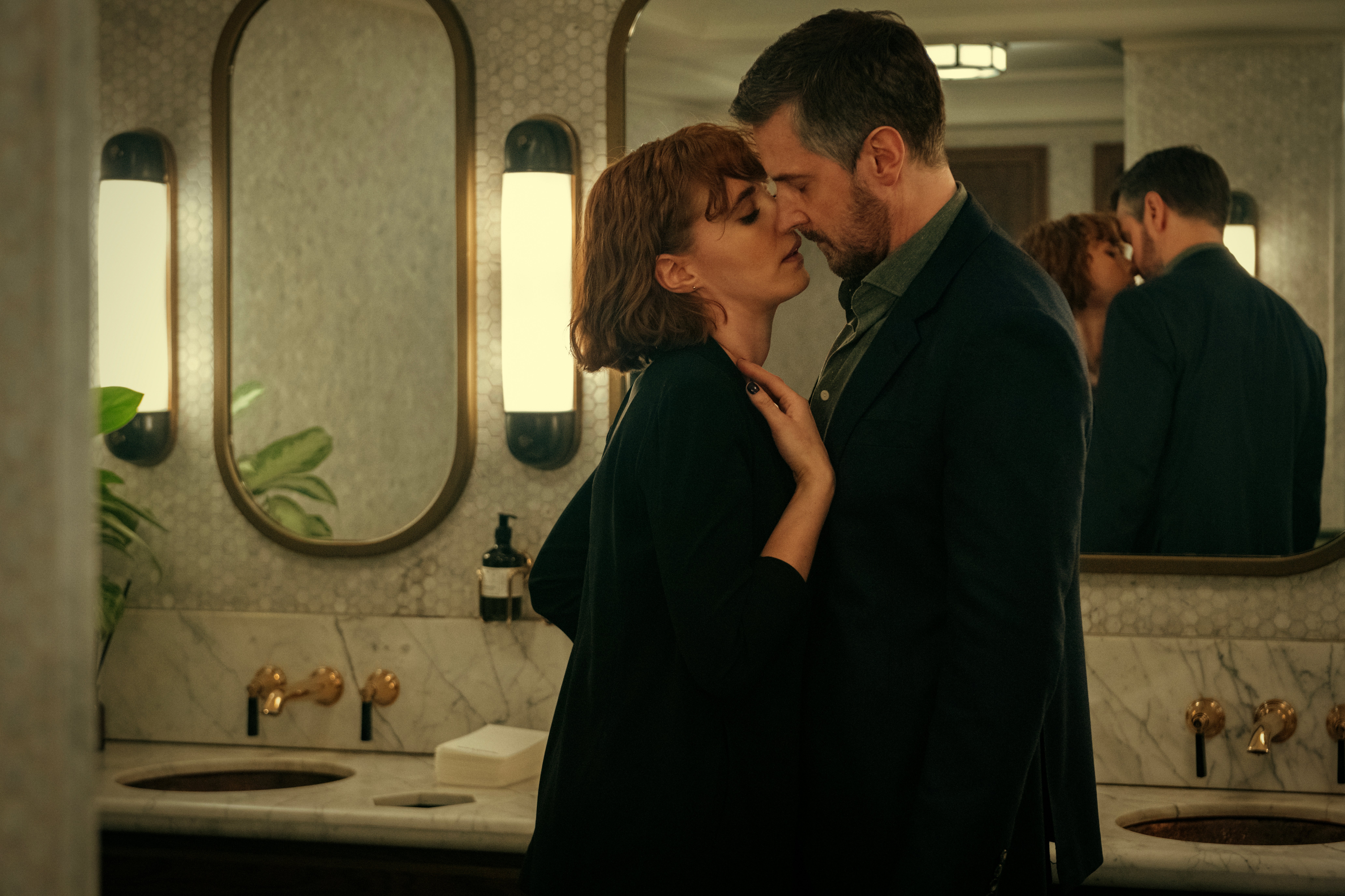 Charlie Murphy and Richard Armitage embrace in ‘Obsession’