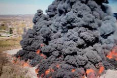 Toxic smoke pours from huge fire at recycling plant
