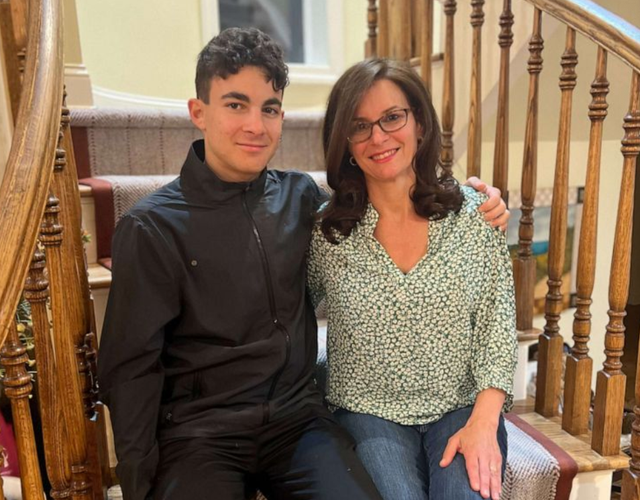 <p>Lianne Mandelbaum and her son Josh, whose peanut allergy became the source of a complaint she filed against United Airline with the US Department of Transportation, claiming her request for an allergen buffer was denied</p>