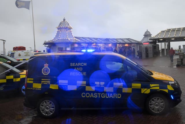<p>A search-and-rescue team at the Palace Pier, Brighton</p>