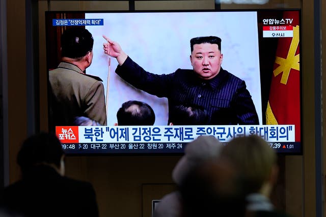 <p>A TV screen shows an image of North Korean leader Kim Jong Un, during a news program at the Seoul Railway Station in Seoul, South Korea, 11 April 2023</p>