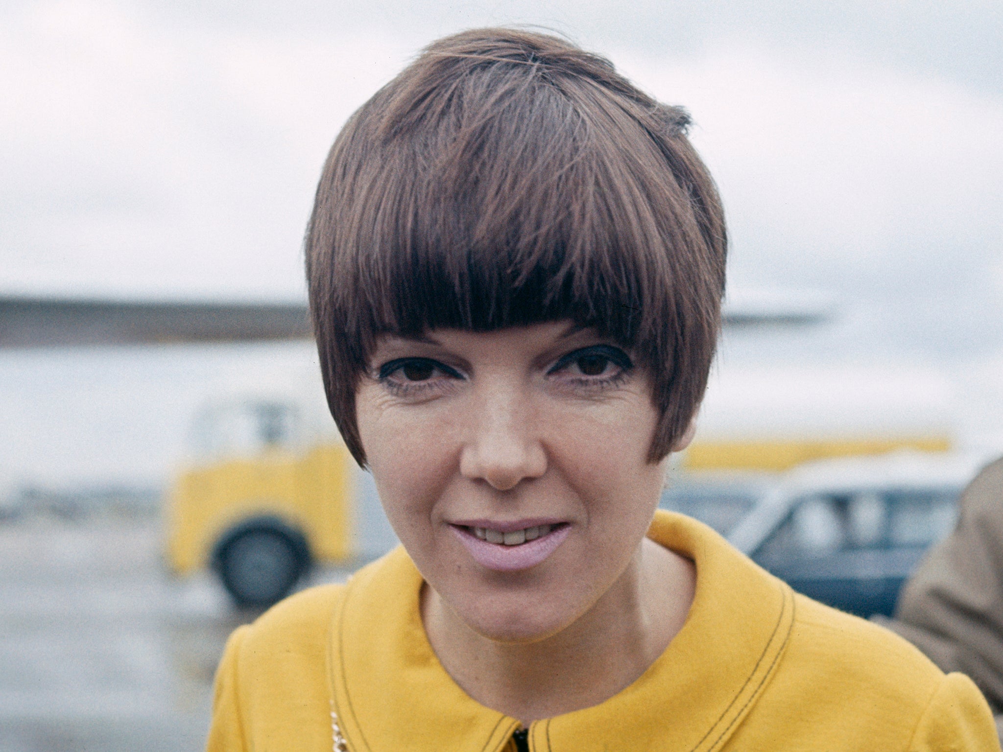 Quant pictured at an airport in London in 1967