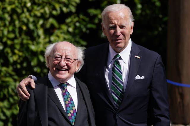 Joe Biden, right, puts his arm around Michael D Higgins on day three of the US president’s trip to the island of Ireland (Brian Lawless/PA)