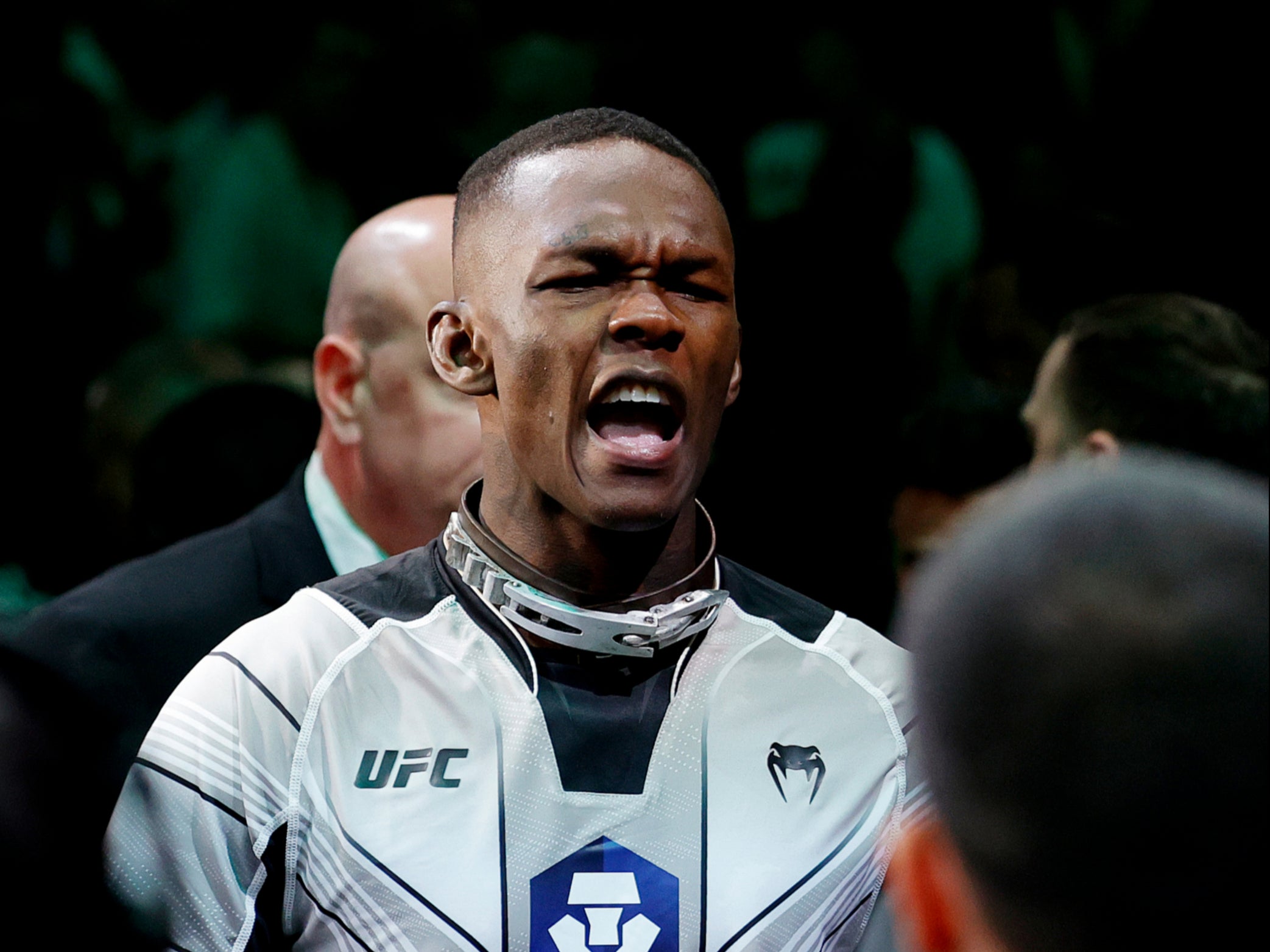 Adesanya sporting a dog collar during his ring walk for his rematch with Pereira