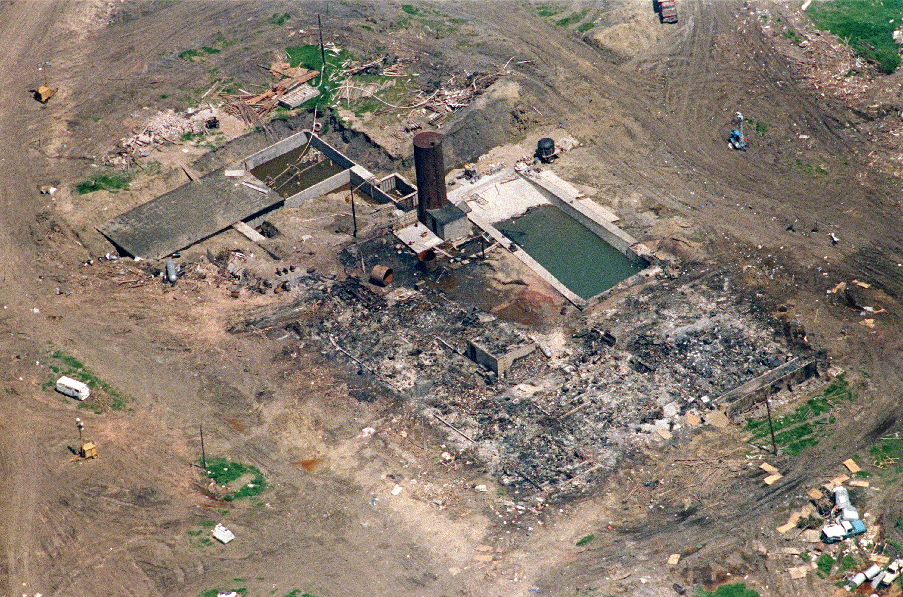 This aerial shot taken 21 April 1993 in Waco shows the burnt remains of the only structure left standing after a fire destroyed the The Branch Davidian cult compound