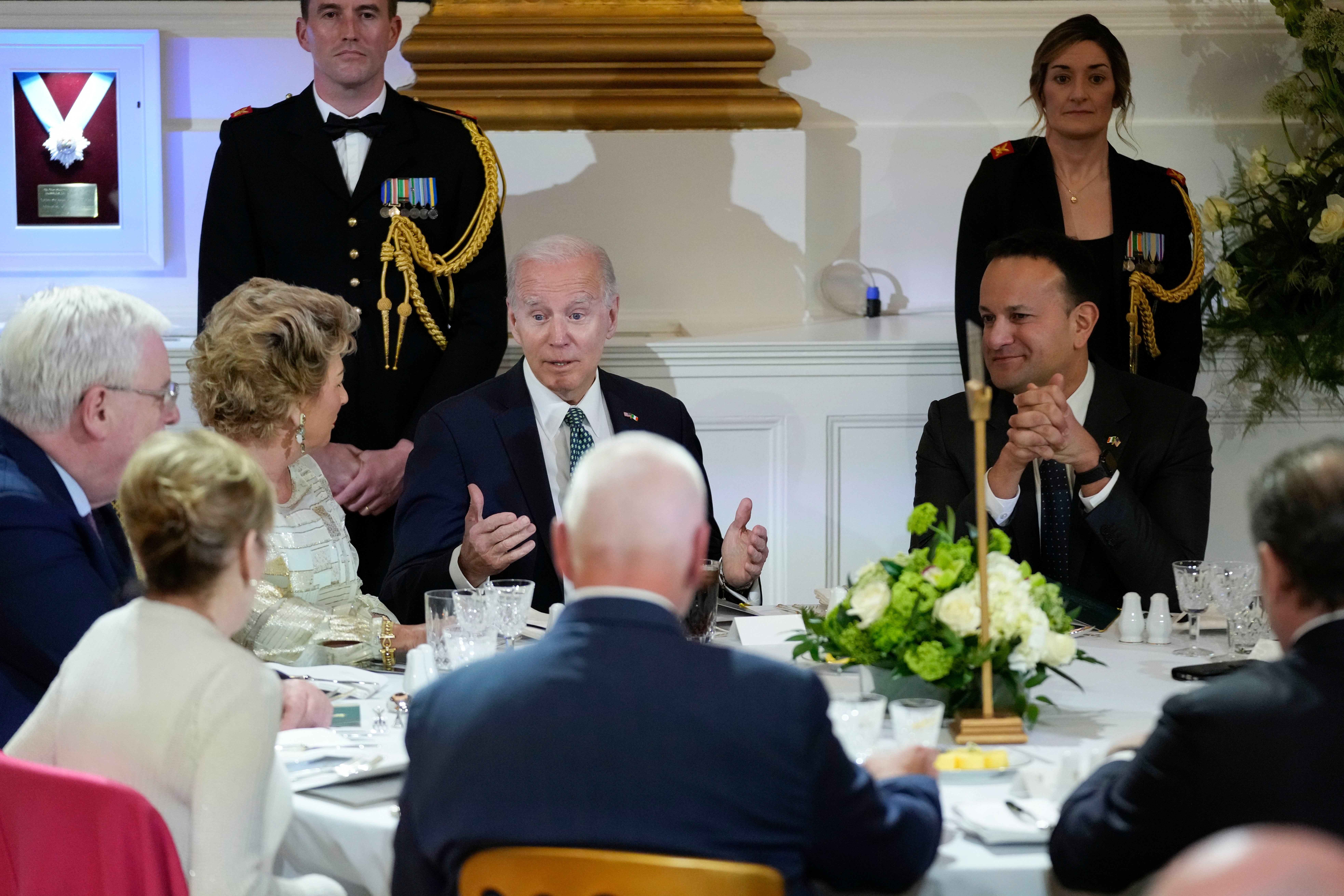 <p>Biden sits next to Varadkar (to his right) at the Dublin Castle dinner</p>