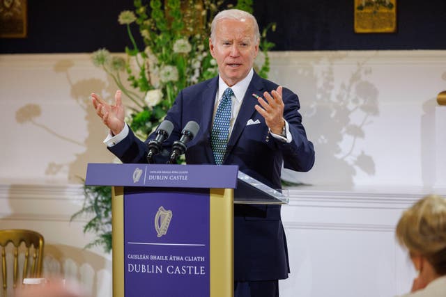 President Joe Biden speaks at a state dinner at Dublin Castle (Julien Behal Photography/PA)