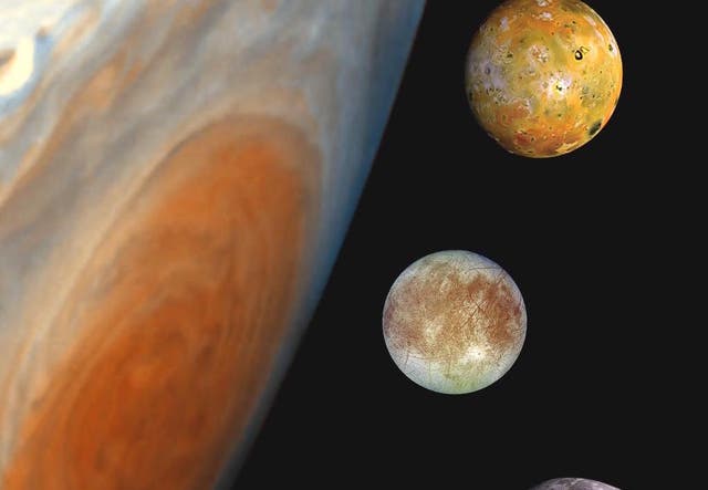 <p>This ‘family portrait’ shows a composite of images of Jupiter, including its Great Red Spot, and its moons</p>