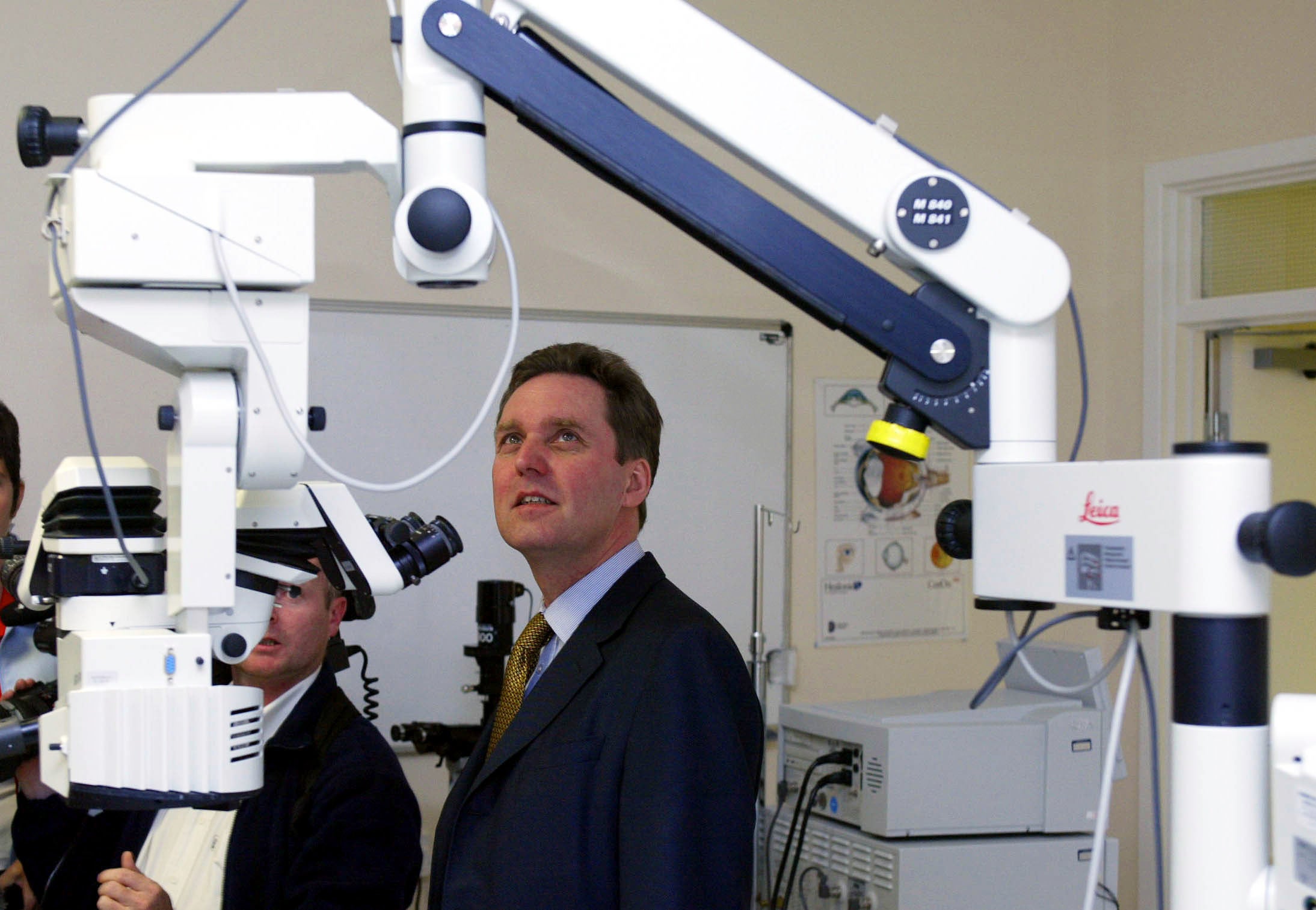 Health secretary Alan Milburn looks at equipment during his visit to the ophthalmology department at Peterborough District Hospital in 2002