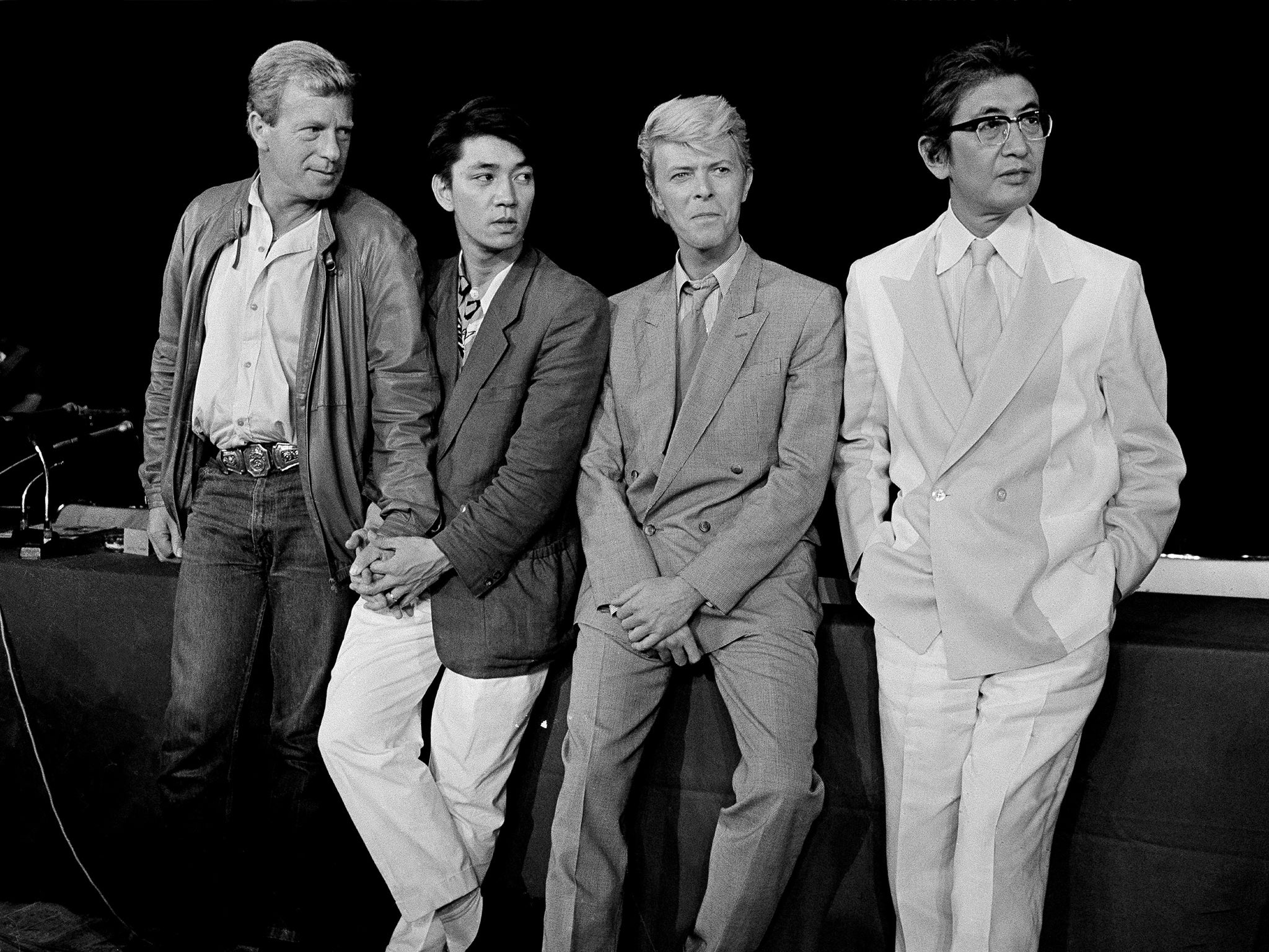 The team behind ‘Merry Christmas, Mr Lawrence’ in Paris in 1983. From left: Jack Thomas, Ryuichi Sakamoto, David Bowie, and Nagisa Oshima