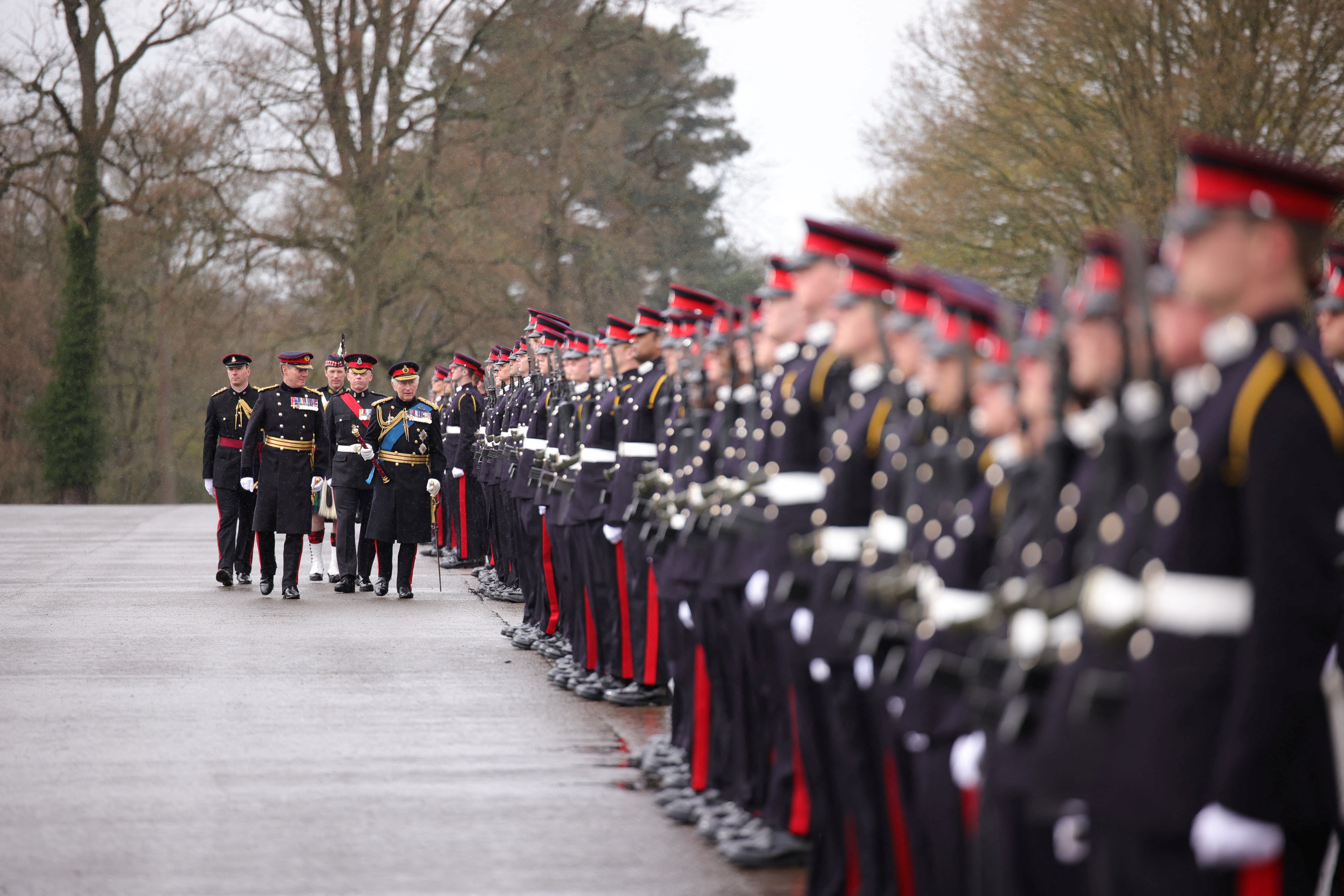 King Charles presented new colours at at the Royal Military Academy, in Sandhurst