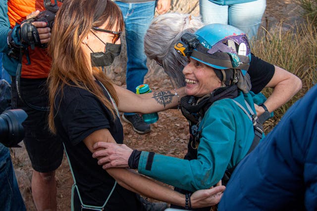 <p>Beatriz Flamini is helped above ground from the cave near at Motril near Granada, Spain</p>