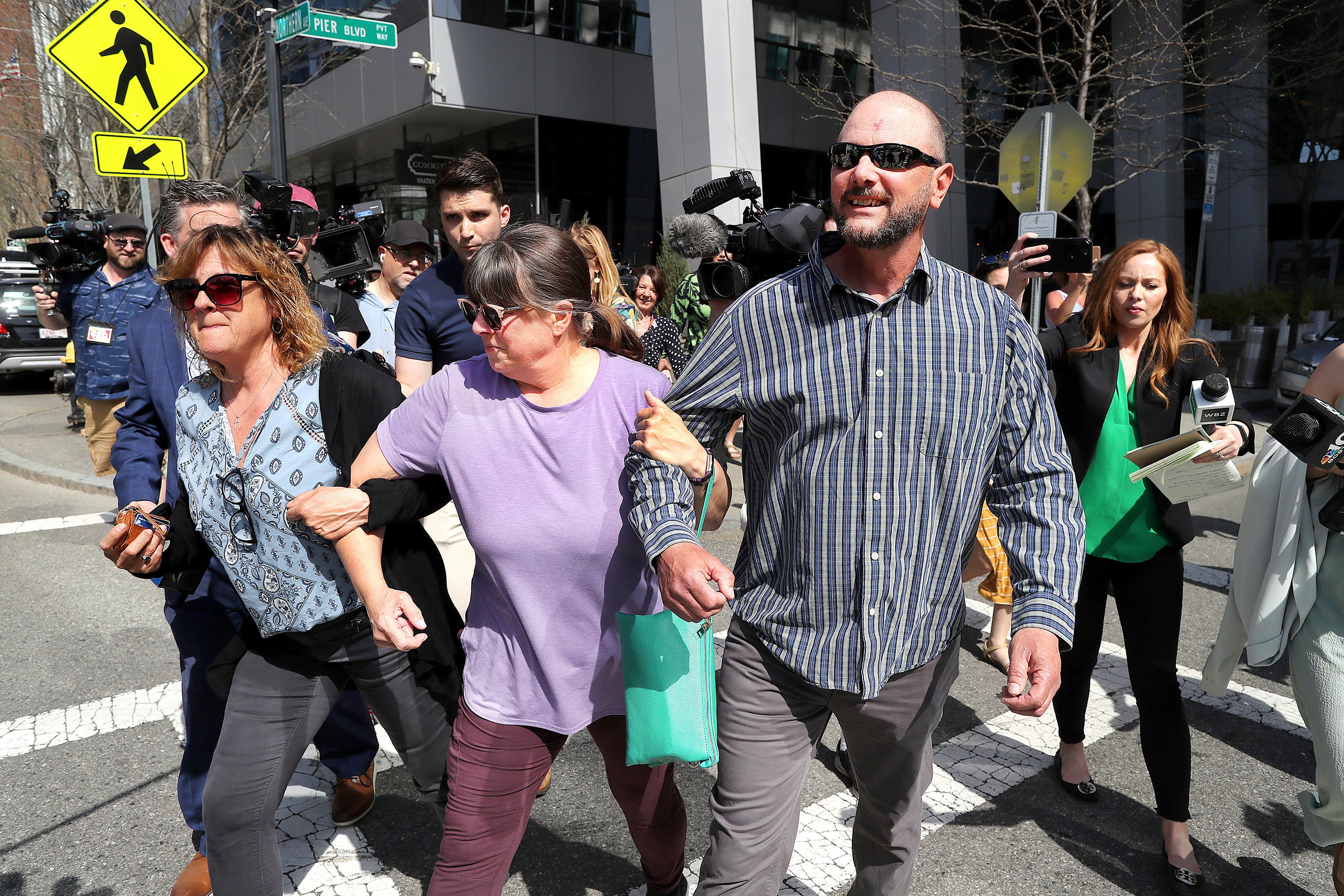 Jack Teixeira’s family members leave the Moakley Federal Courthouse after his arraignment.