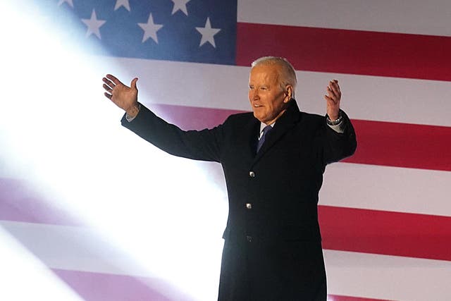 Joe Biden arrives on stage to deliver a speech at St Muredach’s Cathedral in Ballina (Brian Lawless/PA)