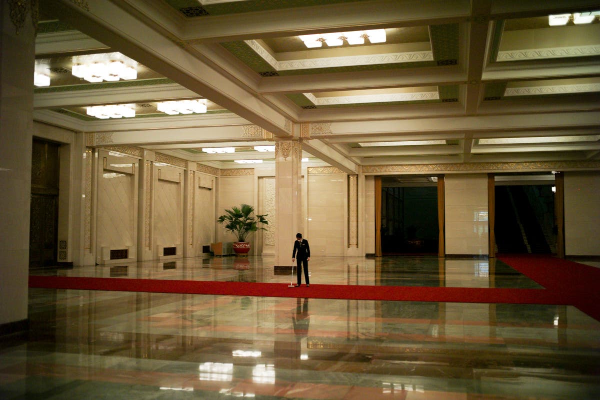 AP PHOTOS: Behind the scenes as Macron visits China