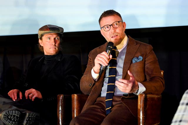 <p>Matthew McConaughey and Guy Ritchie speak onstage during the Special NY Screening of ‘The Gentlemen'</p>