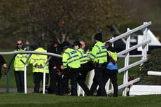 Grand National: More than 100 arrests as protesters attempt to invade course