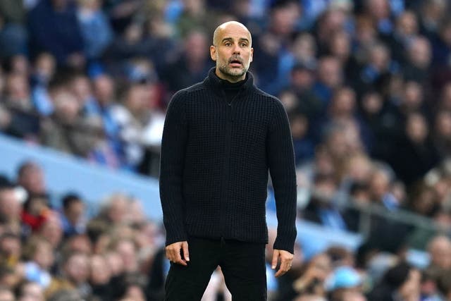 Manchester City manager Pep Guardiola is gunning for Arsenal (Nick Potts/PA)