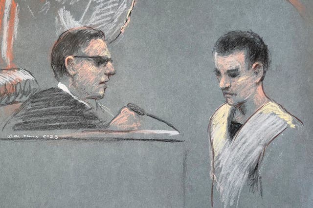 <p>Massachusetts Air National Guardsman Jack Teixeira, right, appears in US District Court in Boston, Friday, 14 April 2023 </p>