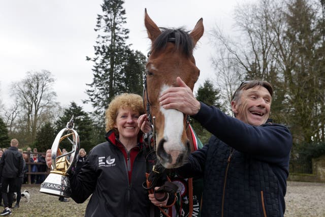Corach Rambler with trainer Lucinda Russell (left) and Peter Scudamore (Steve Welsh/PA)